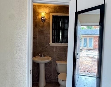 5557 Floral Avenue - Photo Thumbnail 2