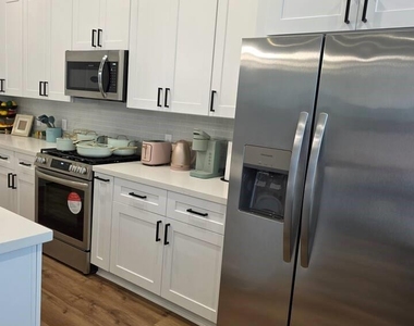 1106 Paul Quinn Street - Photo Thumbnail 2