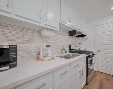6725 Avenue K - Photo Thumbnail 1