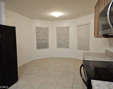 114 Se 3rd Street - Photo Thumbnail 4