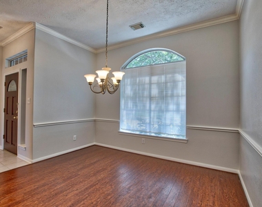 6715 Village Bridge Drive - Photo Thumbnail 1
