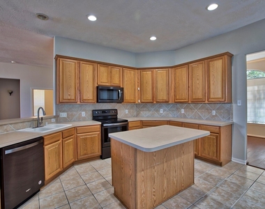 6715 Village Bridge Drive - Photo Thumbnail 7