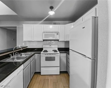 9325 Desert Inn Road - Photo Thumbnail 2