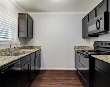 1600 W T C Jester Boulevard - Photo Thumbnail 3