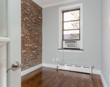 East 32nd St - Photo Thumbnail 3