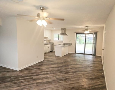 6908 Sunflower Circle N - Photo Thumbnail 2