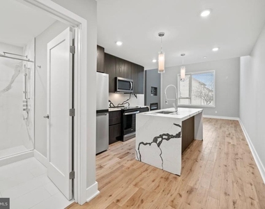 1000 W Girard Avenue - Photo Thumbnail 1