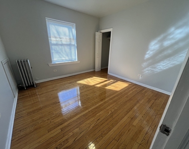 2047 E 68th Street - Photo Thumbnail 2