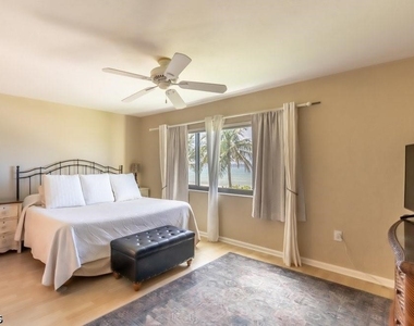10475 Gulf Shore Drive - Photo Thumbnail 10