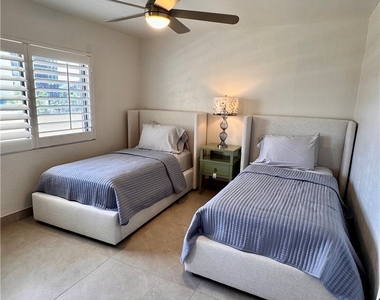 10475 Gulf Shore Drive - Photo Thumbnail 16