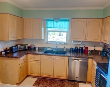 323 Dolphin Parkway - Photo Thumbnail 3