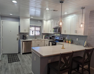 1634 Stickney Point Road - Photo Thumbnail 1