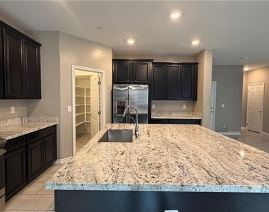6943 Denio Island Street - Photo Thumbnail 11