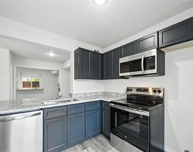 5626 Preston Oaks Road - Photo Thumbnail 13