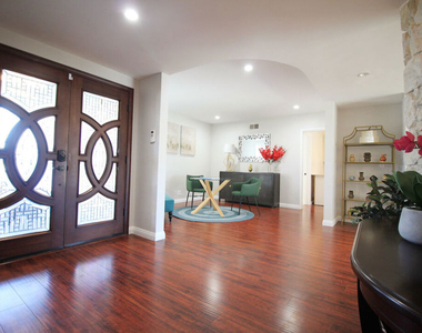 6605 S Sherbourne Drive - Photo Thumbnail 1