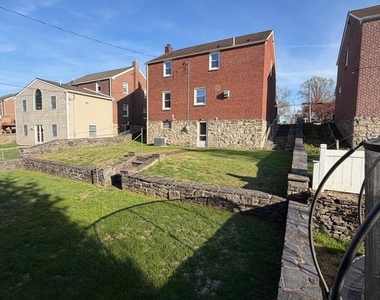 1711 Robinson Avenue - Photo Thumbnail 1