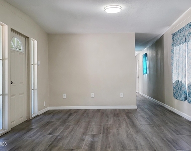 6877 Blue Bonnet Drive - Photo Thumbnail 3