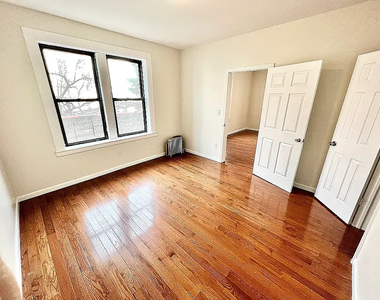 102-45 Corona Avenue - Photo Thumbnail 1