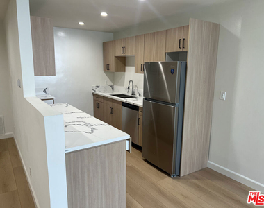1253 N Hayworth Avenue - Photo Thumbnail 1