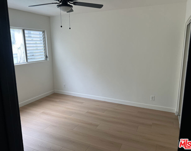1253 N Hayworth Avenue - Photo Thumbnail 3