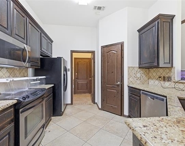 9008 Winding River Drive - Photo Thumbnail 15