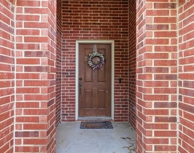 9008 Winding River Drive - Photo Thumbnail 4