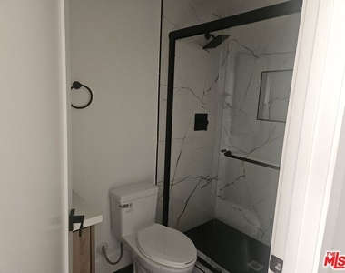 3209 W W 18th Street - Photo Thumbnail 4