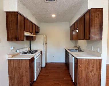 1203 W 49th St - Photo Thumbnail 2