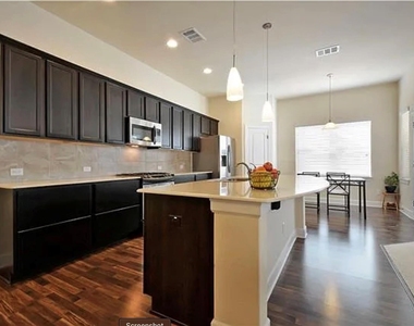 2405 Erica Kaitlin Ln - Photo Thumbnail 2