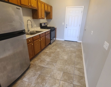 1409 E 69th Place - Photo Thumbnail 1