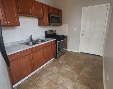 1407 E 69th Place - Photo Thumbnail 3