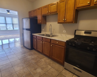 1407 E 69th Place - Photo Thumbnail 2