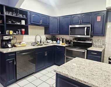 7714 Deleuil Avenue - Photo Thumbnail 2
