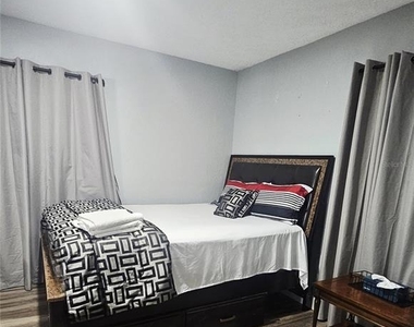 7714 Deleuil Avenue - Photo Thumbnail 6