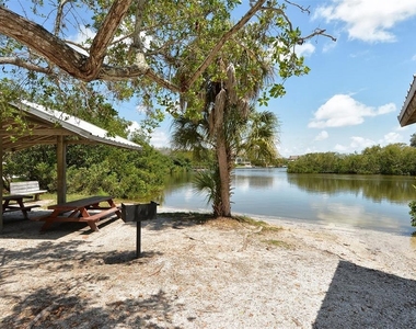 9393 Midnight Pass Road - Photo Thumbnail 65