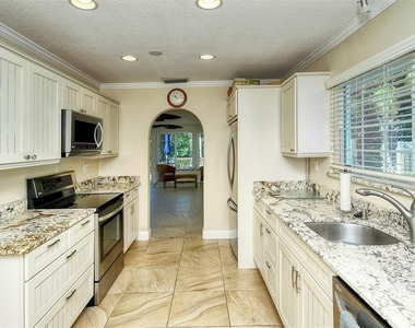 9393 Midnight Pass Road - Photo Thumbnail 41