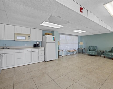 9393 Midnight Pass Road - Photo Thumbnail 54