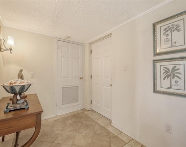 9393 Midnight Pass Road - Photo Thumbnail 1