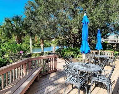 9393 Midnight Pass Road - Photo Thumbnail 44