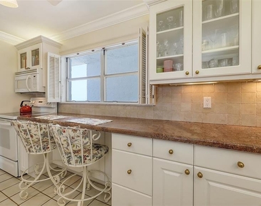 9393 Midnight Pass Road - Photo Thumbnail 4