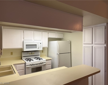 930 N Sloan Lane - Photo Thumbnail 3