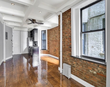 W 103rd St - Photo Thumbnail 1