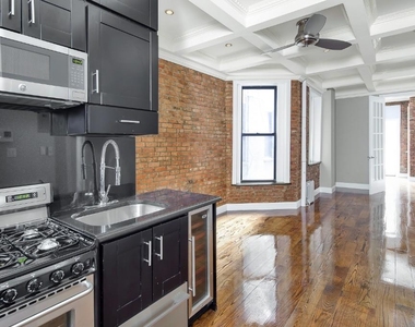 W 103rd St - Photo Thumbnail 2