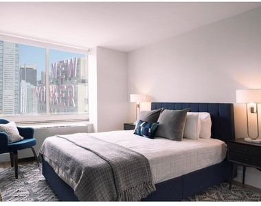 315 W 33rd St - Photo Thumbnail 2