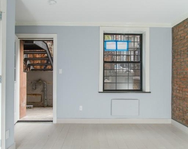 221 East 11th Street - Photo Thumbnail 2