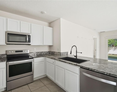 5217 Hillside Meadow Place - Photo Thumbnail 7