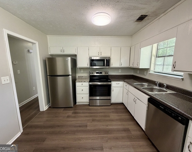 5663 Saint Thomas Drive - Photo Thumbnail 4