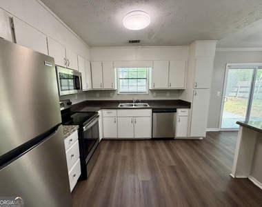 5663 Saint Thomas Drive - Photo Thumbnail 5