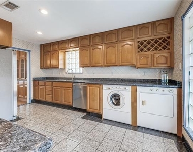 9210 Larchwood Drive - Photo Thumbnail 3