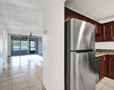 9440 Poinciana Place - Photo Thumbnail 1